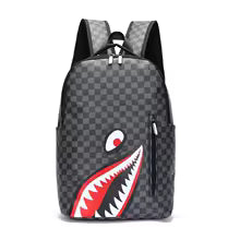 grey sprayground with shark